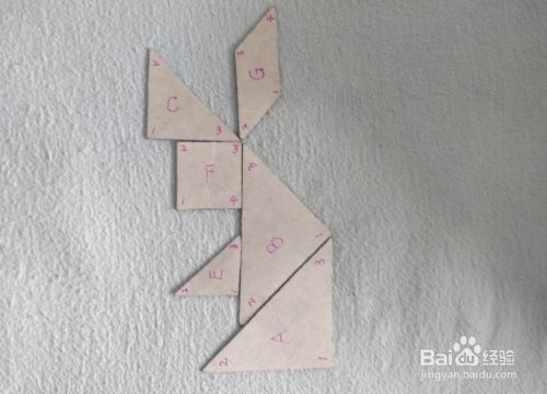 用七巧板怎样拼一只坐着的兔子?