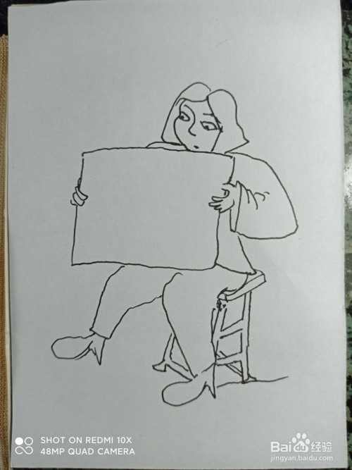 怎样画简笔画坐着看报的女人?