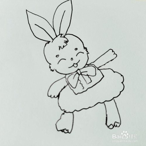 如何来画一只穿裙子的卡通兔子简笔画呢?