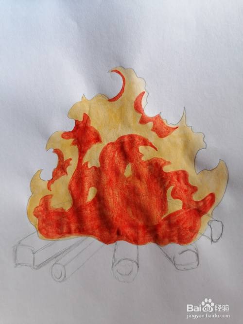 用朱红水彩在中间画出火焰烧得最旺的地方
