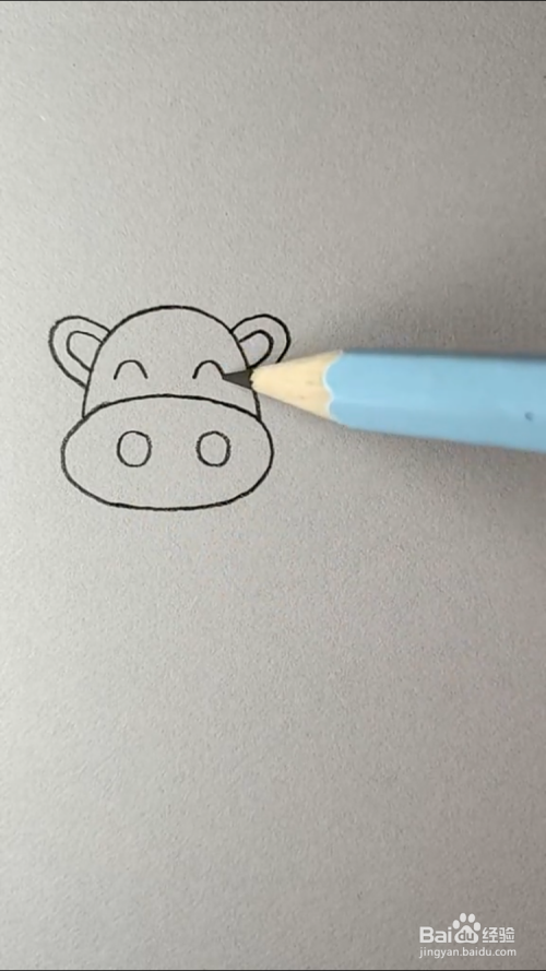 手工/爱好 > 书画/音乐1 首先画出牛的耳朵,眼睛,鼻子,如下图所示.