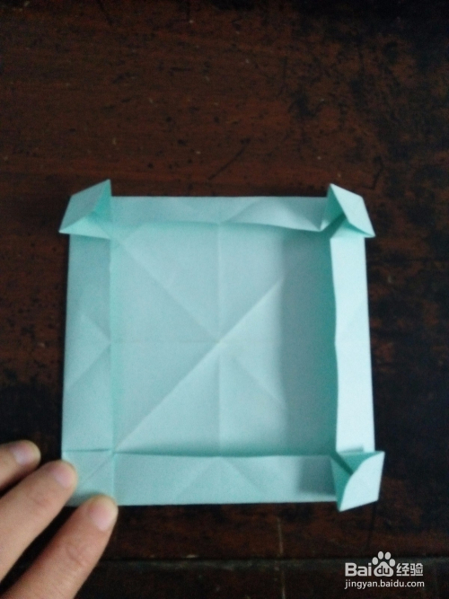 怎么用纸来折花瓣收纳盒