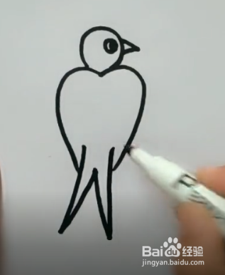 在心形上面画个圆作为燕子的头 3 画燕子的眼睛和嘴巴 4 画燕子的尾巴