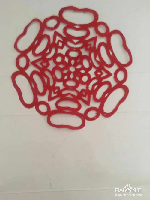 儿童剪纸 一副圈圈团花图案 怎样用彩纸裁剪