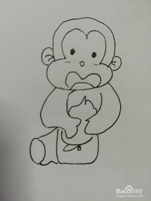 第七步,然后把可爱的小猴子的两只小腿画出来,注意小猴子是坐着的.