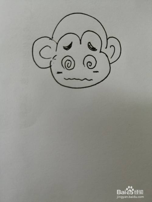 第四步,然后继续画出机灵的小猴子的嘴巴,注意嘴巴弧度的画法.