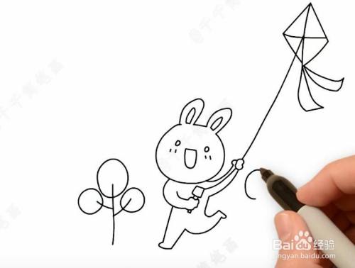 然后画一个风筝,兔子在放风筝.