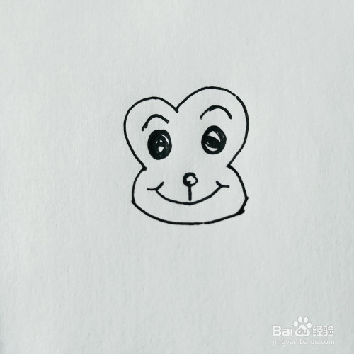 第二步,我们来画卡通猴子的眼睛和嘴巴部分.