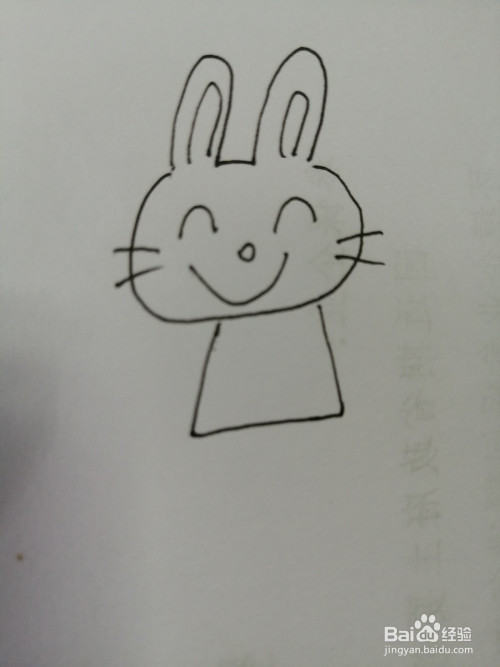 第五步,接着我们继续把可爱的小兔子的身体部分画出来.