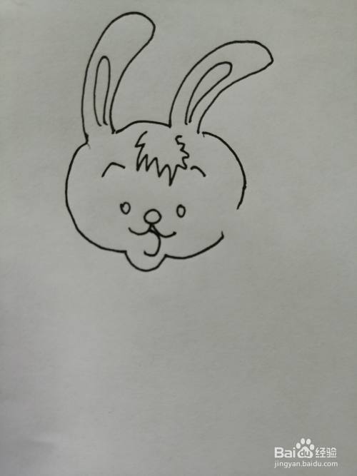 第四步,然后我们继续画出可爱的小兔子的小嘴巴,小嘴巴很可爱.