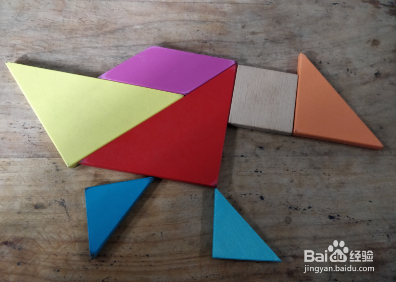 用七巧板怎样拼一只向前跑的小鸡？