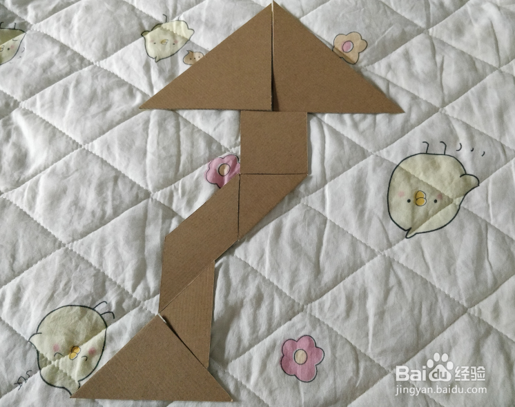 用七巧板怎么拼一只飞在空中的风筝呢？