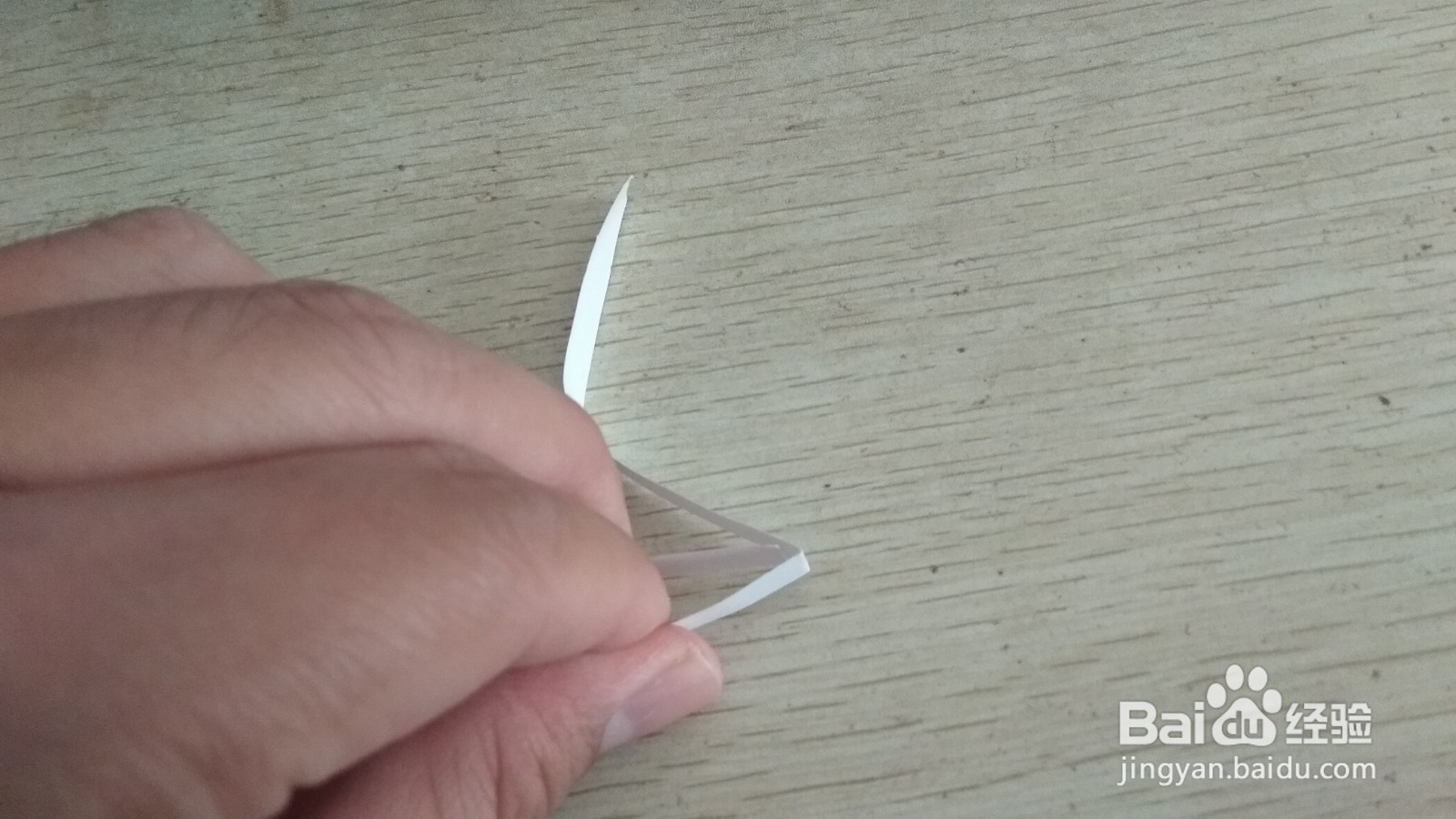 如何用一个长方形纸条做两面放中性笔的支架