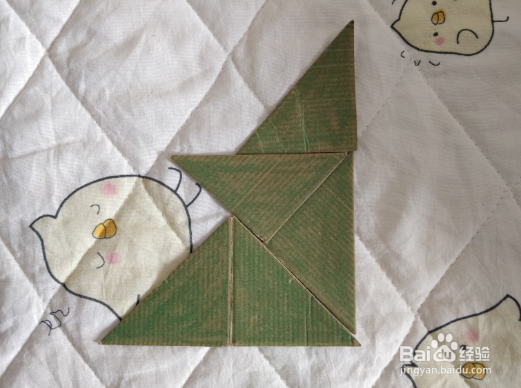 用九巧板怎么拼一个正在讲课的老师呢?
