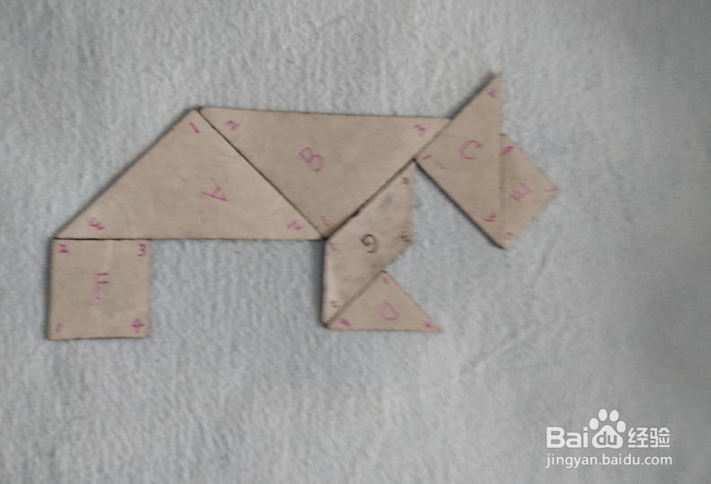 用七巧板怎样拼一头站着的犀牛？