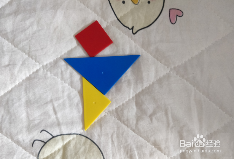 用七巧板智力拼图怎么拼一个大步奔跑的女孩？