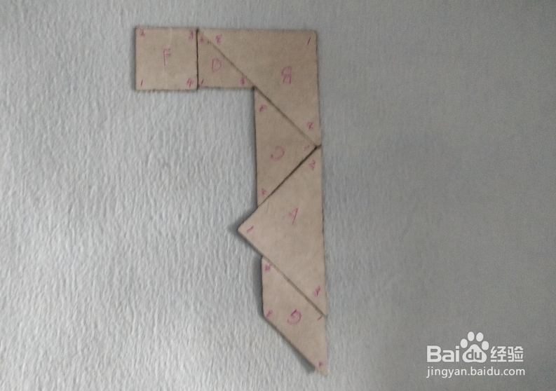 用七巧板怎样拼一只曲棍球杆?