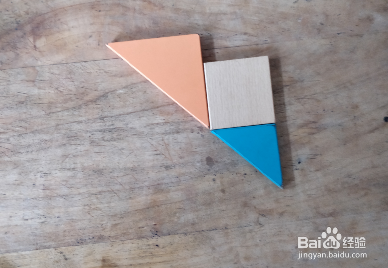 用七巧板怎样拼一只低着头的鸟儿？