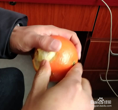 没有刀怎么吃橙子
