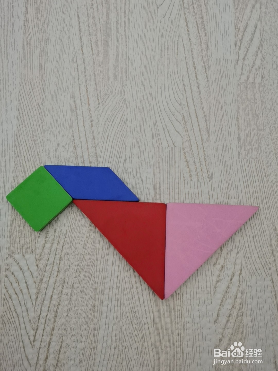 怎么样用七巧板拼一只捉虫子的小鸡仔