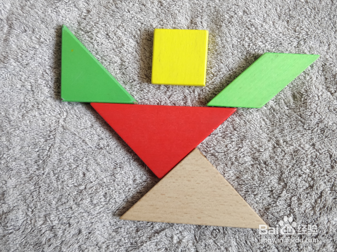 用七巧板怎么拼一个伸展运动的体育老师呢？