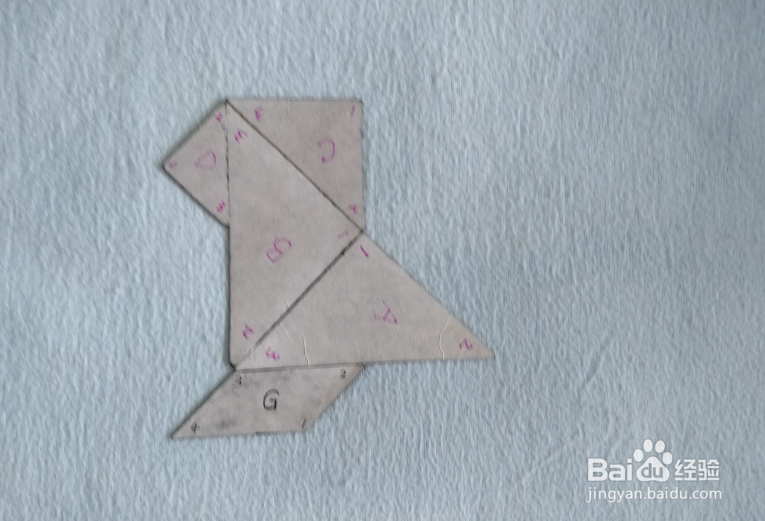 用七巧板怎样拼一只小狮子狗?