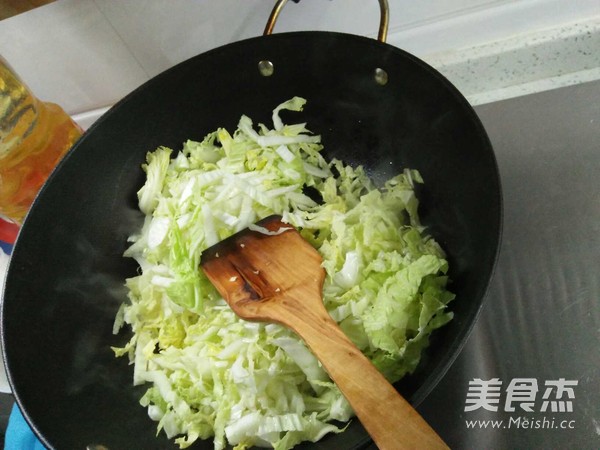 白菜炒丸子的做法