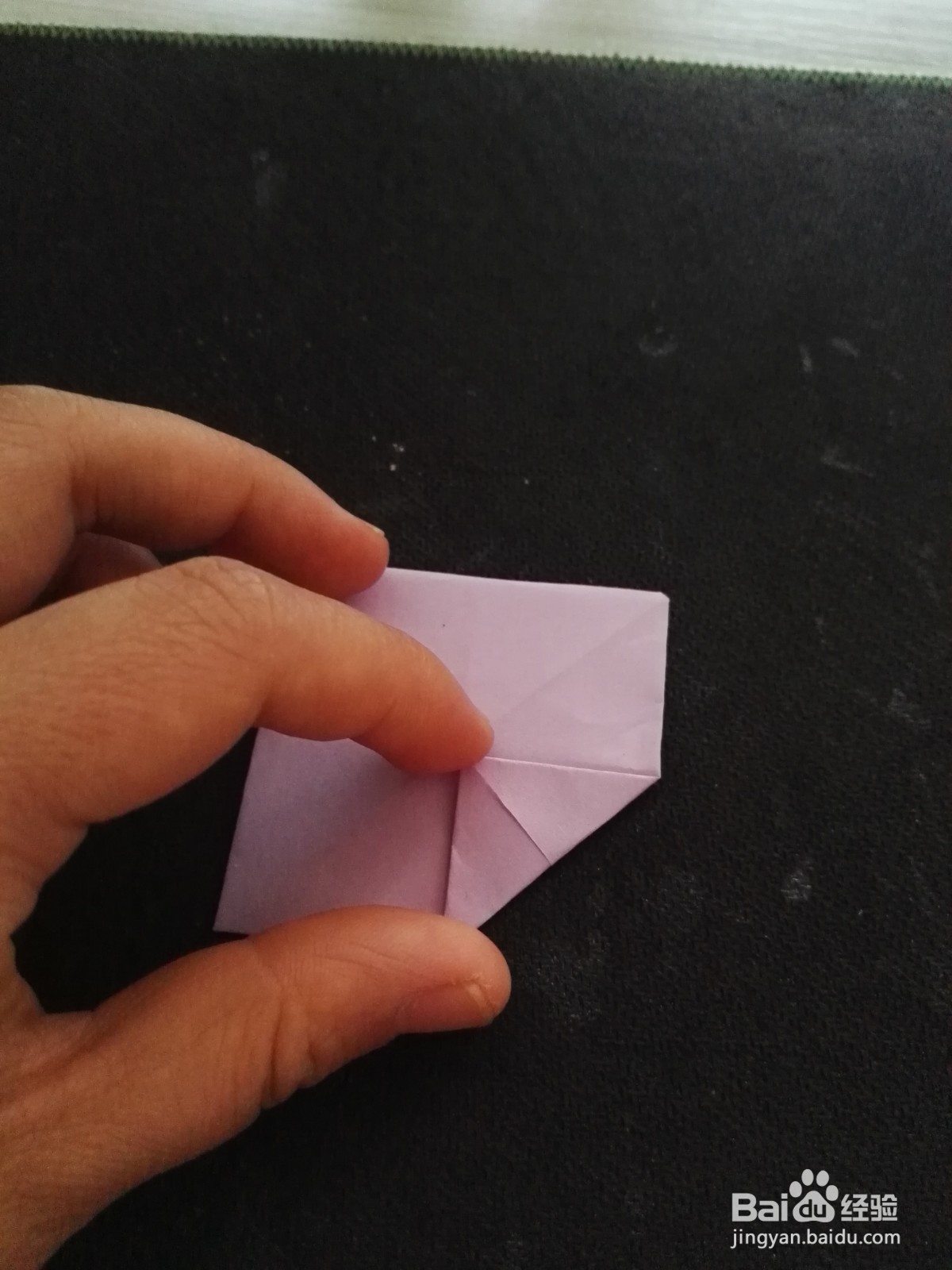 小男孩喜欢的小斧头的折法