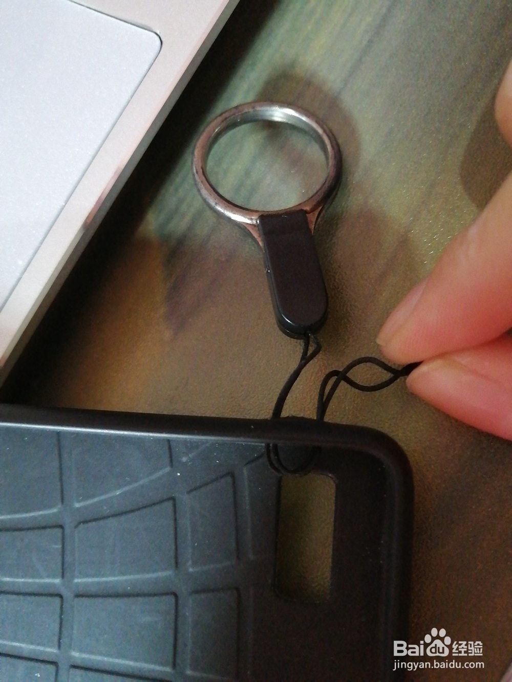 买手机壳送的挂绳怎么用