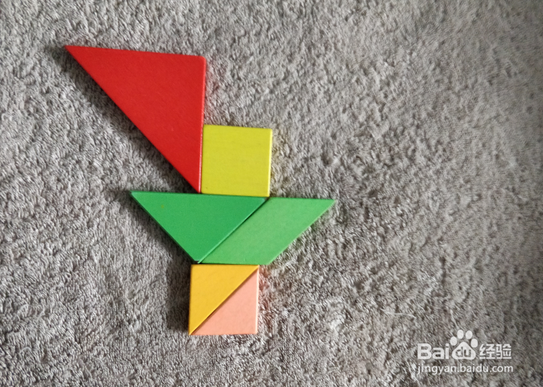 用七巧板怎样拼一只红酒起子？