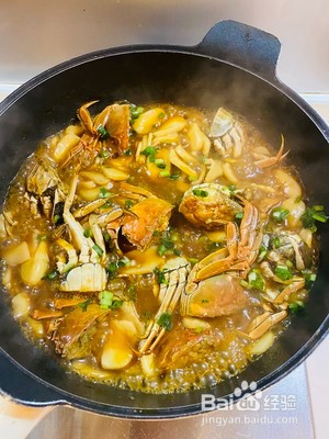 螃蟹炒年糕的做法