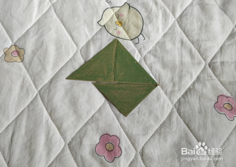 用九巧板怎么拼一个练习蒙古舞的小哥哥呢？