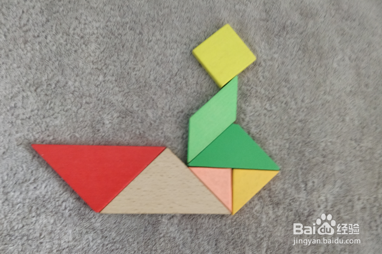 用七巧板怎样拼一个坐船尾的女士?