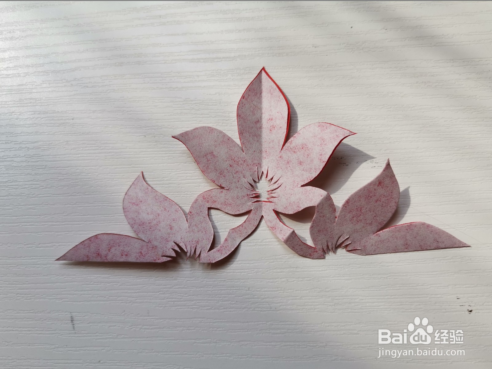 幼儿手工剪纸四瓣窗花怎么剪？