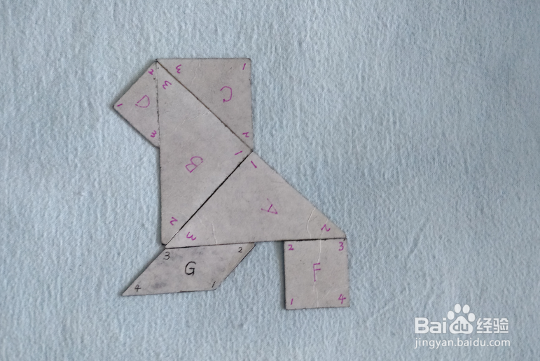 用七巧板怎样拼一只小狮子狗?