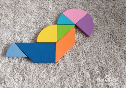 用九巧板拼图玩具怎样拼一只站着的(大嘴)鸟?