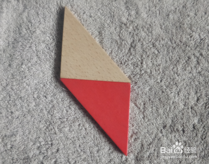 用七巧板怎样拼一只端坐竖尾的小松鼠呢