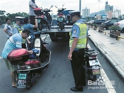 电动车被交警扣了怎么办?