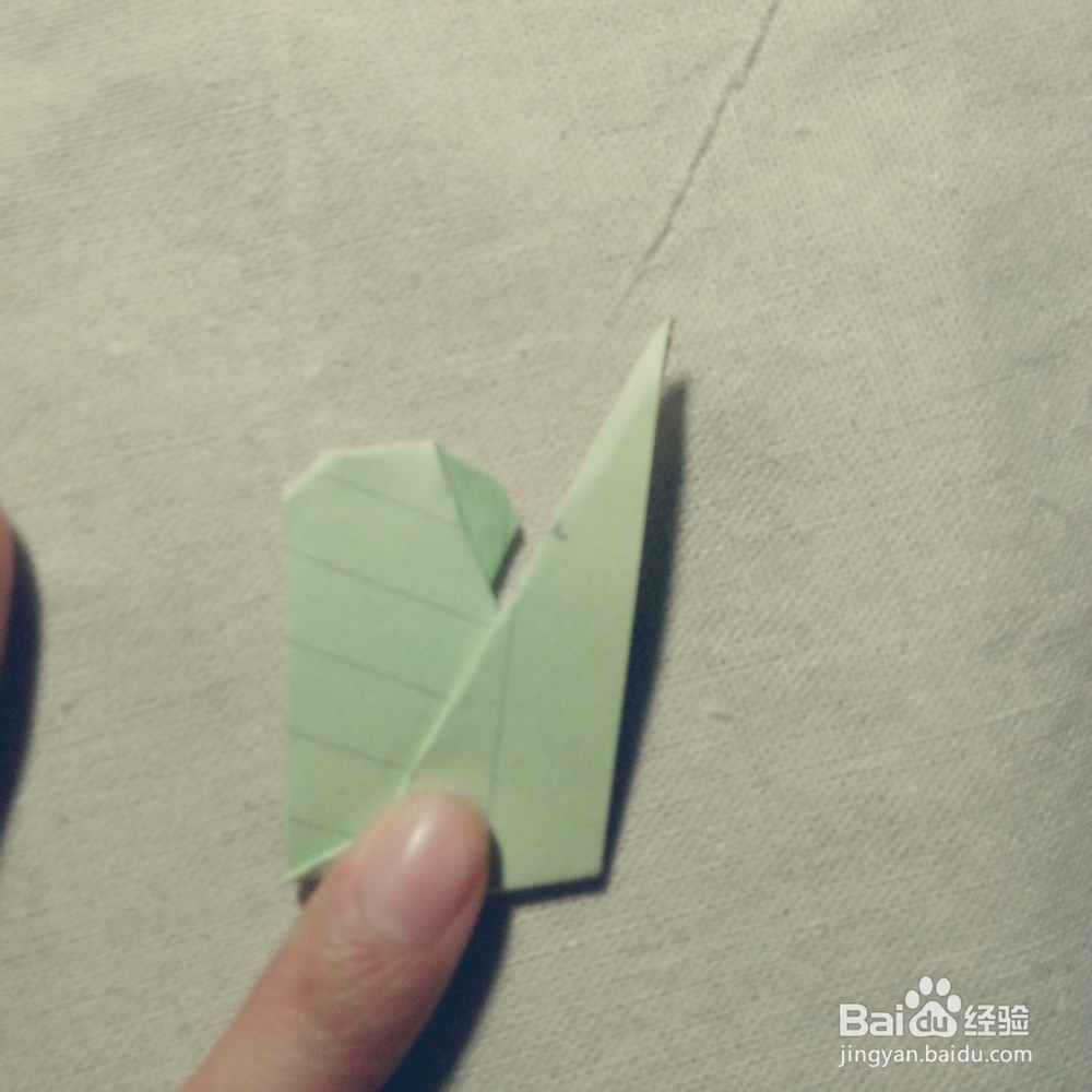 和小朋友一起用废纸折动物吧：[15]折小猴子
