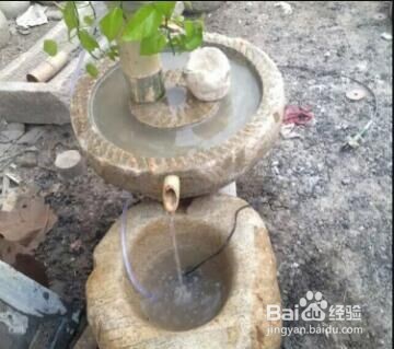 老磨摆放在院子里怎样装饰