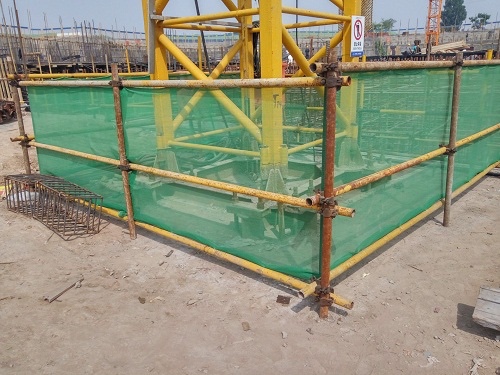 建筑施工时外面的绿网有什么作用