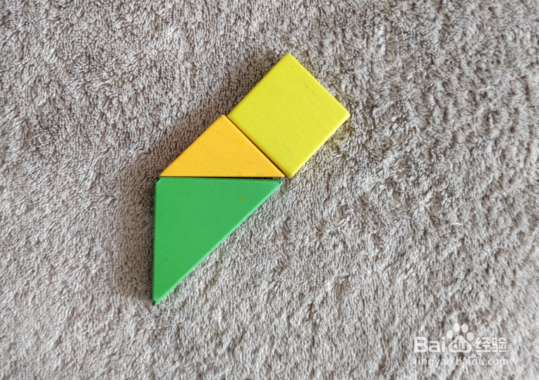 用七巧板怎样拼一个杏核？