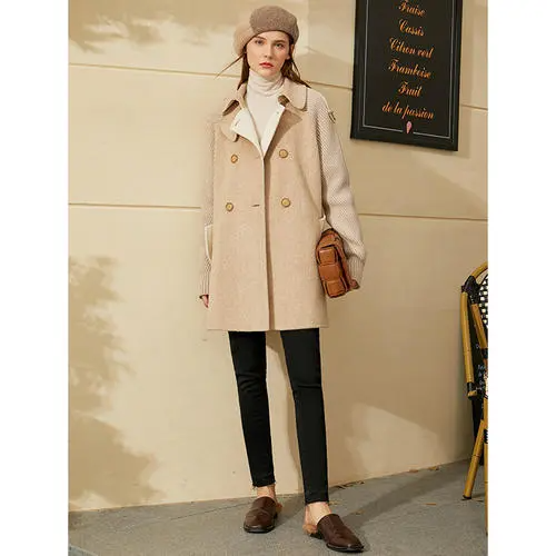 羊毛大衣上有白色的硬毛是啥