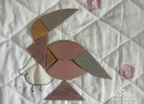 回头望天的乌鸦用蛋形九巧板怎么拼?