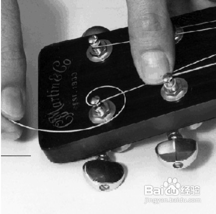 怎样给木吉他上弦