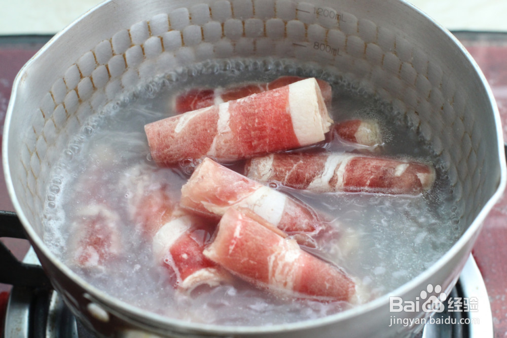 辣白菜肥牛炒年糕的做法