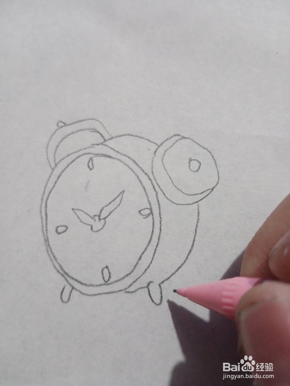 闹钟的简笔画怎么画?