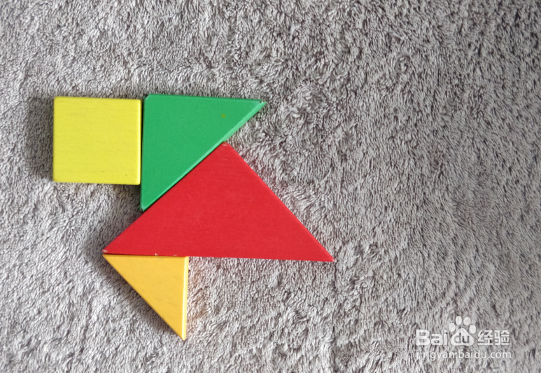 用七巧板怎样拼一只奔跑的狗？