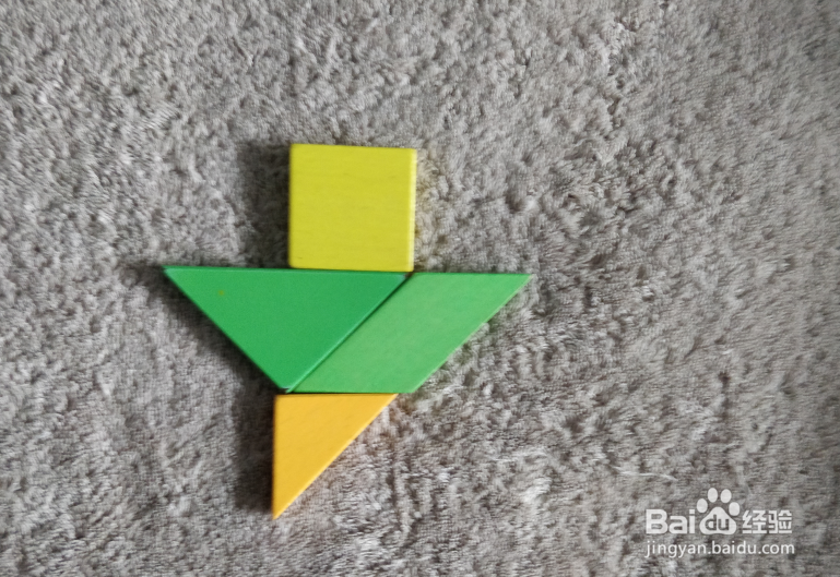 用七巧板怎样拼一只红酒起子？