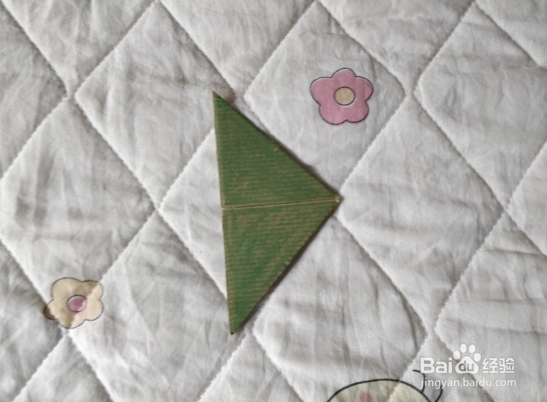 用九巧板怎么拼一个种子瓶呢